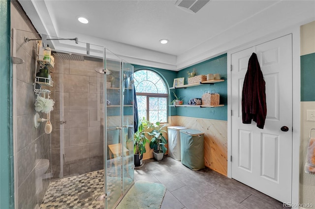 full bathroom featuring a stall shower, tile patterned flooring, and recessed lighting