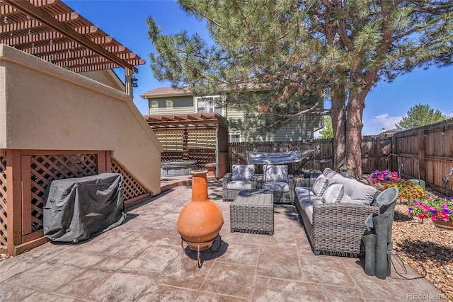 view of patio featuring a pergola, outdoor lounge area, a fenced backyard, a hot tub, and a grill