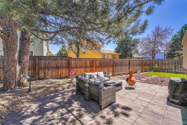 view of patio / terrace featuring a fenced backyard and an outdoor hangout area