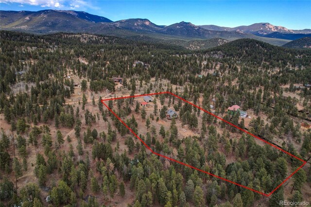 64 Elk Horn Ct, Bailey, CO 80421 - drone / aerial view featuring a forest view and a mountain view