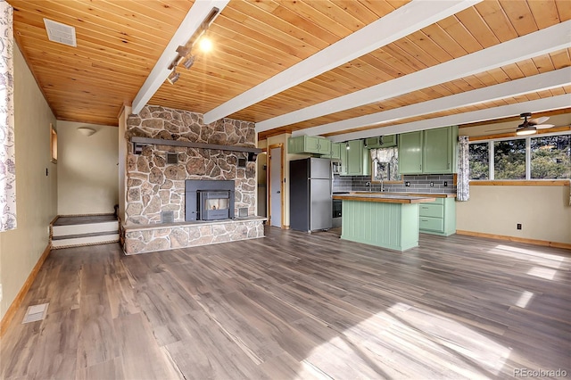 64 Elk Horn Ct, Bailey, CO 80421 - interior space featuring wooden ceiling, beam ceiling, dark wood finished floors, baseboards, and visible vents