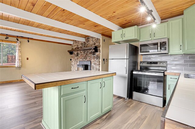 64 Elk Horn Ct, Bailey, CO 80421 - kitchen featuring tile counters, green cabinets, wooden ceiling, and stainless steel appliances