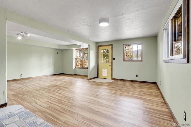 64 Elk Horn Ct, Bailey, CO 80421 - empty room featuring light wood finished floors and baseboards