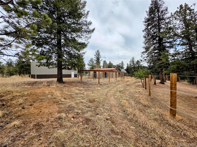 64 Elk Horn Ct, Bailey, CO 80421 - view of yard with an outdoor structure and an outbuilding
