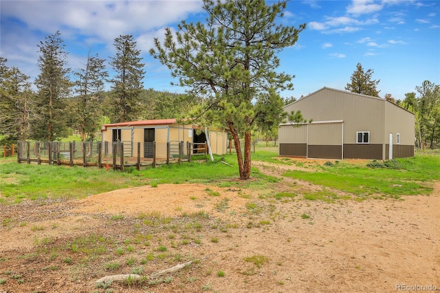 64 Elk Horn Ct, Bailey, CO 80421 - view of yard with a pole building, an outbuilding, and an exterior structure