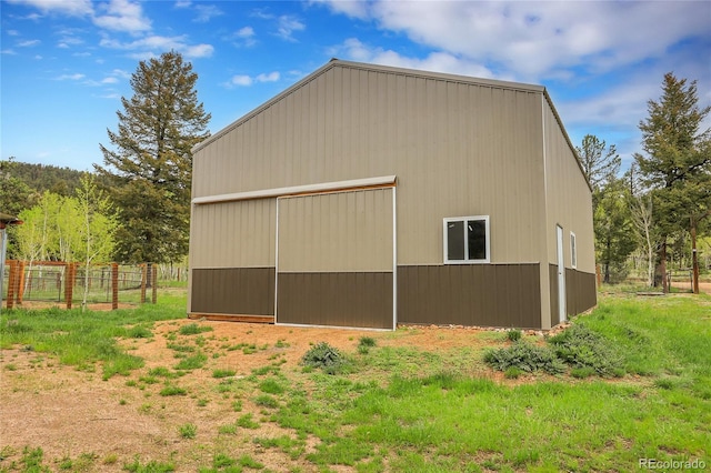 64 Elk Horn Ct, Bailey, CO 80421 - view of home's exterior with a pole building and an outdoor structure