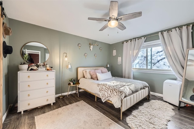 bedroom featuring ceiling fan and dark hardwood / wood-style flooring