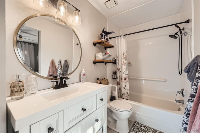 full bathroom with tile patterned flooring, vanity, toilet, shower / tub combo with curtain, and ceiling fan