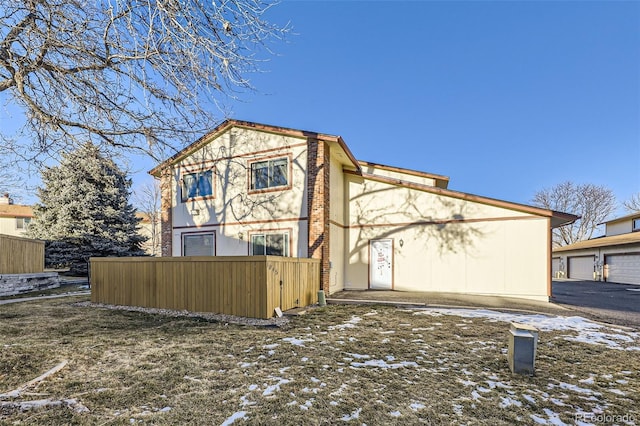 view of snow covered house