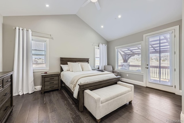 bedroom with dark hardwood / wood-style floors, access to exterior, ceiling fan, and vaulted ceiling