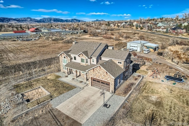 drone / aerial view with a mountain view