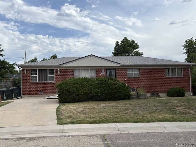 11882 Irma Dr, Northglenn, CO 80233 - ranch-style home featuring brick siding, a front yard, and roof with shingles