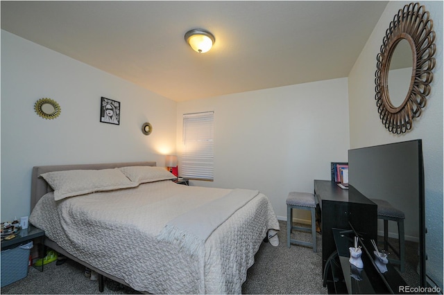 carpeted bedroom with baseboards