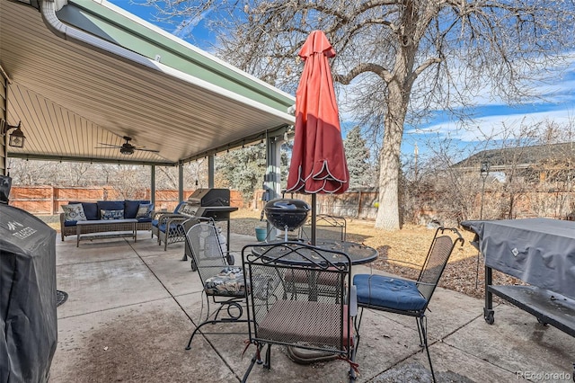 view of patio featuring an outdoor living space, ceiling fan, and a grill