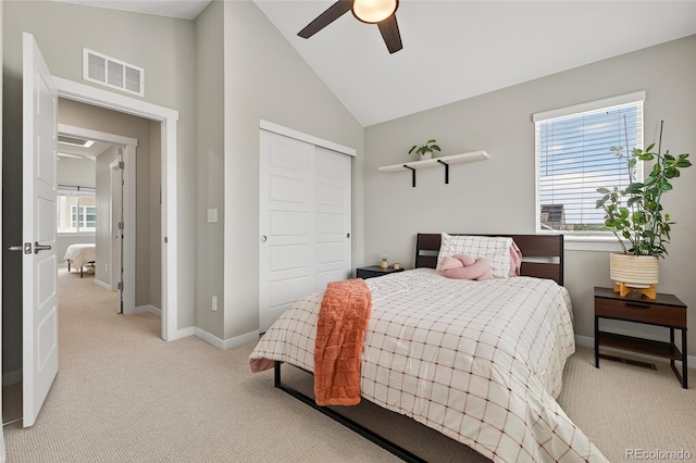 5396 Quail St, Wheat Ridge, CO 80033 - bedroom with light colored carpet, a closet, lofted ceiling, and a ceiling fan