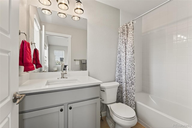 5396 Quail St, Wheat Ridge, CO 80033 - bathroom with vanity and shower / bath combo with shower curtain