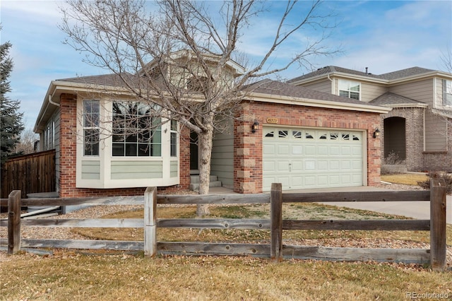 view of front of home with a garage