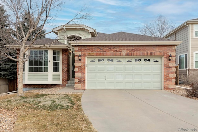 view of front of property featuring a garage