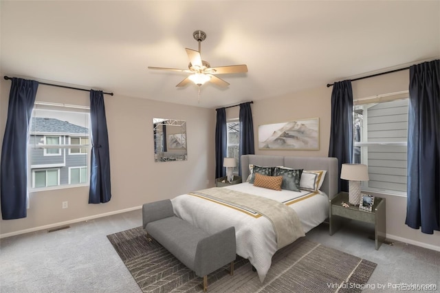 carpeted bedroom featuring ceiling fan