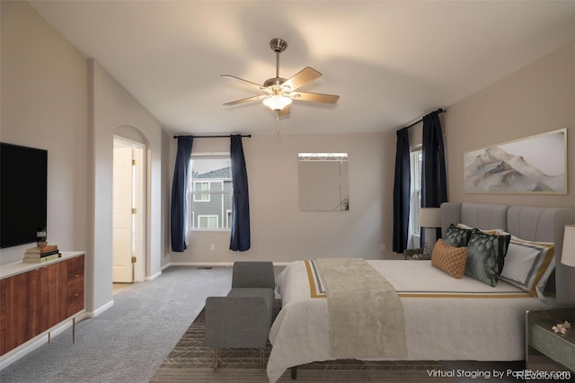 carpeted bedroom featuring ceiling fan