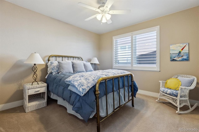 bedroom with carpet floors, baseboards, and a ceiling fan