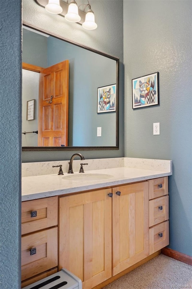 12421 High Country Trl, Littleton, CO 80127 - bathroom with a textured wall and vanity
