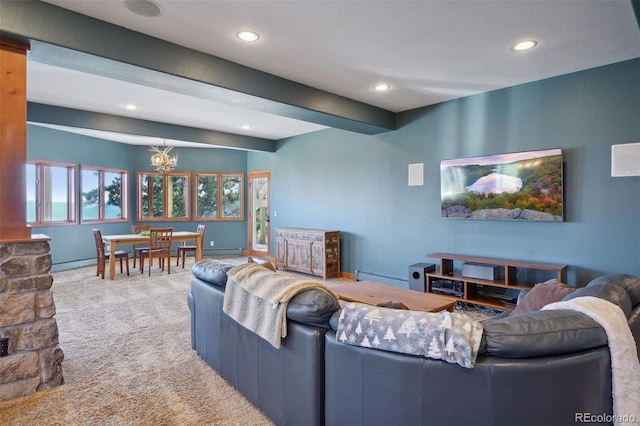 living room with carpet and a chandelier