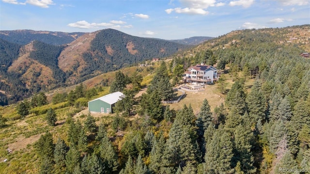 12421 High Country Trl, Littleton, CO 80127 - view of property location featuring a forest and a mountainous background