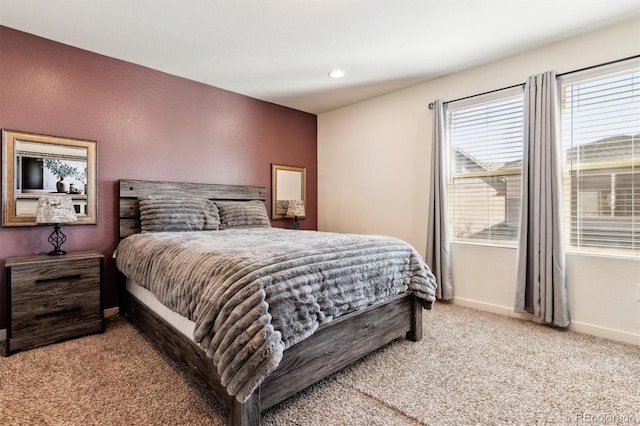 bedroom with light colored carpet