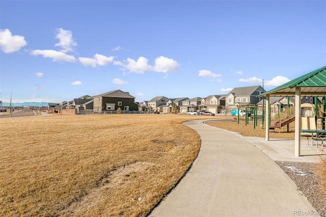 view of home's community with a playground