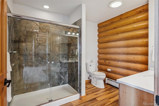 bathroom with log walls, wood finished floors, toilet, a baseboard radiator, and a marble finish shower