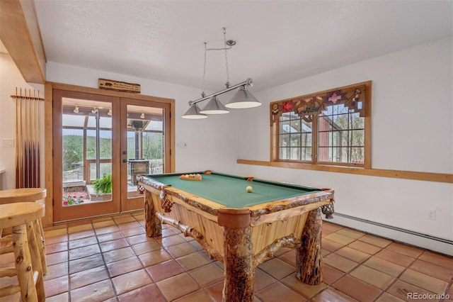 rec room featuring french doors, billiards, plenty of natural light, and a baseboard radiator