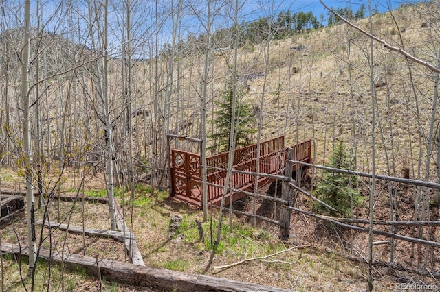 exterior space with a view of trees
