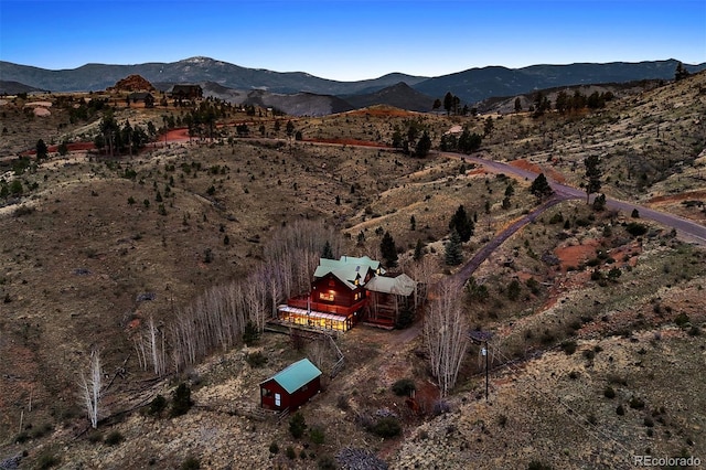aerial view with a mountain view and a rural view