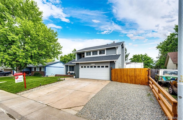 7840 W Portland Ave, Littleton, CO 80128 - traditional-style home featuring concrete driveway and a shingled roof