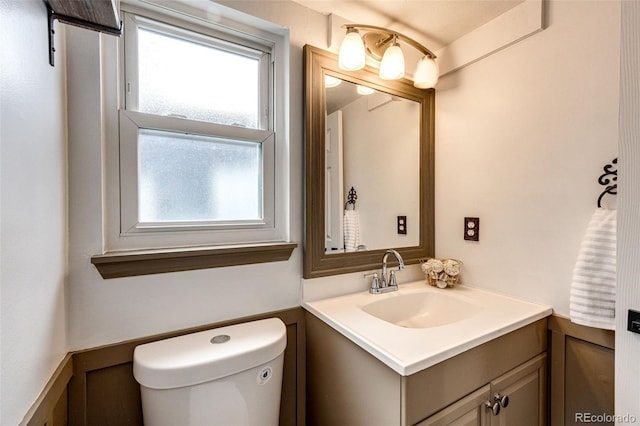 7840 W Portland Ave, Littleton, CO 80128 - bathroom featuring vanity and toilet