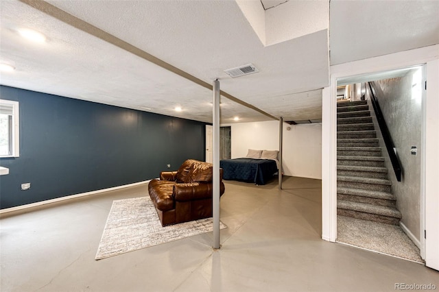 7840 W Portland Ave, Littleton, CO 80128 - below grade area with stairway and a textured ceiling