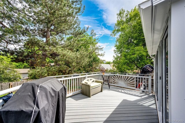 7840 W Portland Ave, Littleton, CO 80128 - wooden deck featuring area for grilling