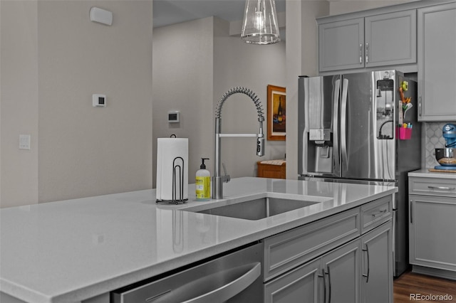 379 Silver Rock Trl, Castle Rock, CO 80104 - kitchen featuring gray cabinets, stainless steel dishwasher, and light countertops