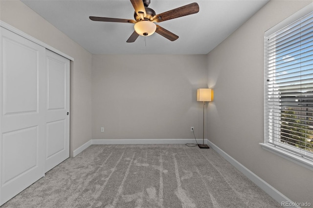 379 Silver Rock Trl, Castle Rock, CO 80104 - unfurnished bedroom featuring carpet flooring, a ceiling fan, and a closet