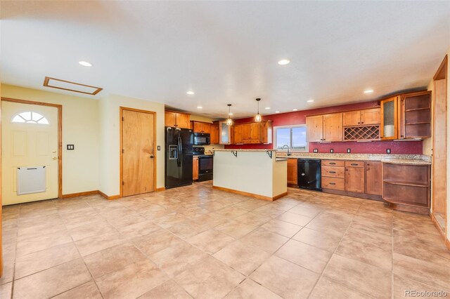 kitchen featuring black appliances, a kitchen island, glass insert cabinets, and open shelves