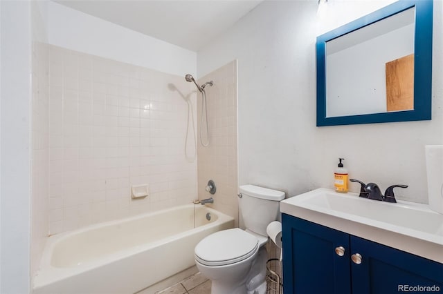 bathroom featuring bathing tub / shower combination, toilet, and vanity