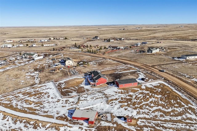 snowy aerial view with a rural view