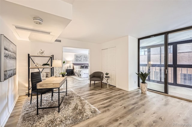 1551 Larimer St Unit 703, Denver, CO 80202 - office space with wood finished floors, a wall of windows, and baseboards