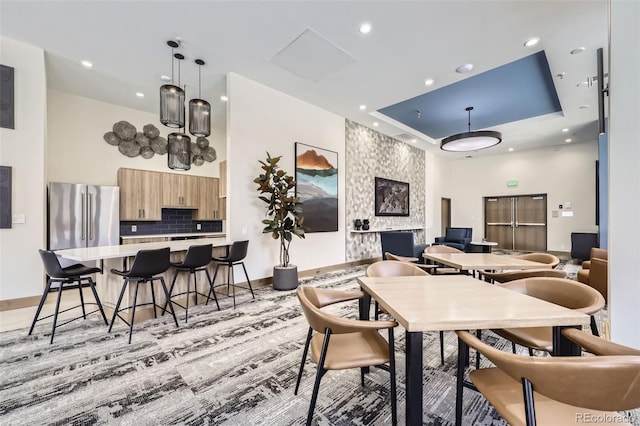 1551 Larimer St Unit 703, Denver, CO 80202 - dining space featuring baseboards and recessed lighting
