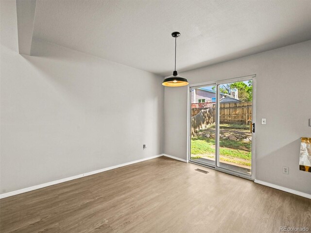 3535 Beechwood Ct, Colorado Springs, CO 80918 - unfurnished dining area featuring wood finished floors and baseboards
