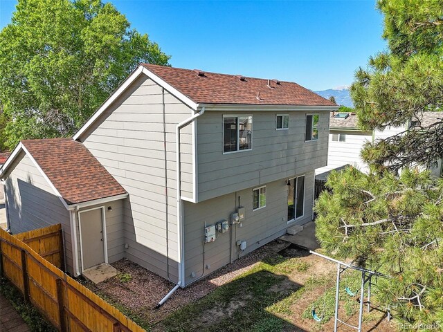 3535 Beechwood Ct, Colorado Springs, CO 80918 - back of property with roof with shingles