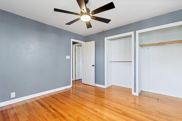 unfurnished bedroom with ceiling fan and light wood-type flooring