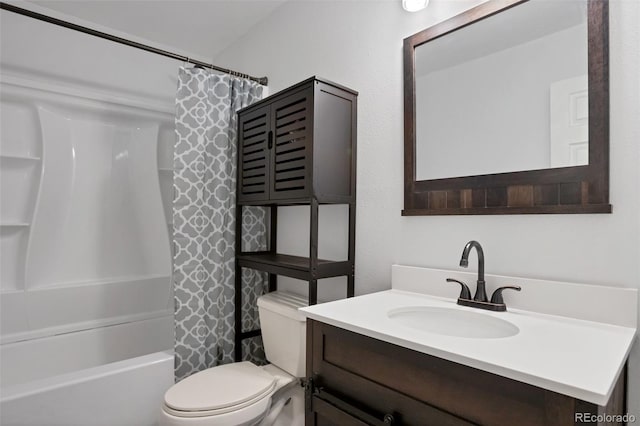 full bathroom featuring shower / bathtub combination with curtain, vanity, and toilet