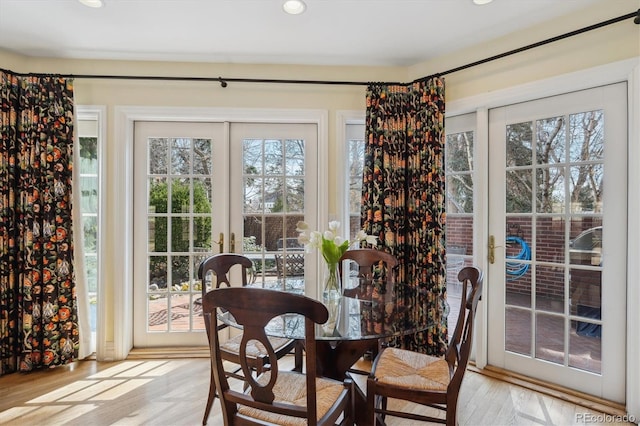 dining room with french doors and a wealth of natural light